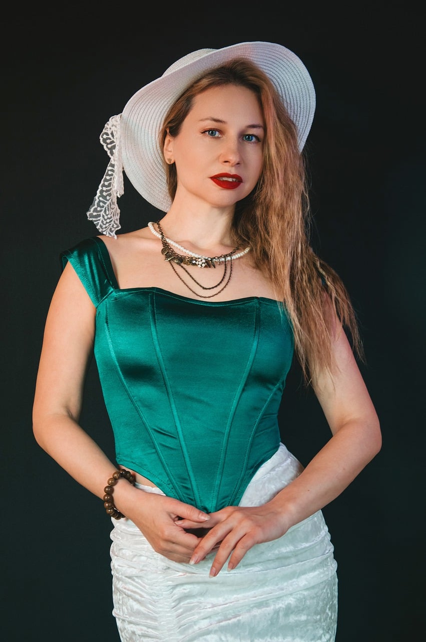 woman, fashion, style, model, posing, femininity, beautiful, young woman, blonde, classic, attire, jewelry, necklace, hat, satin top, light green, fashion photography, elegance, beauty, fashion style